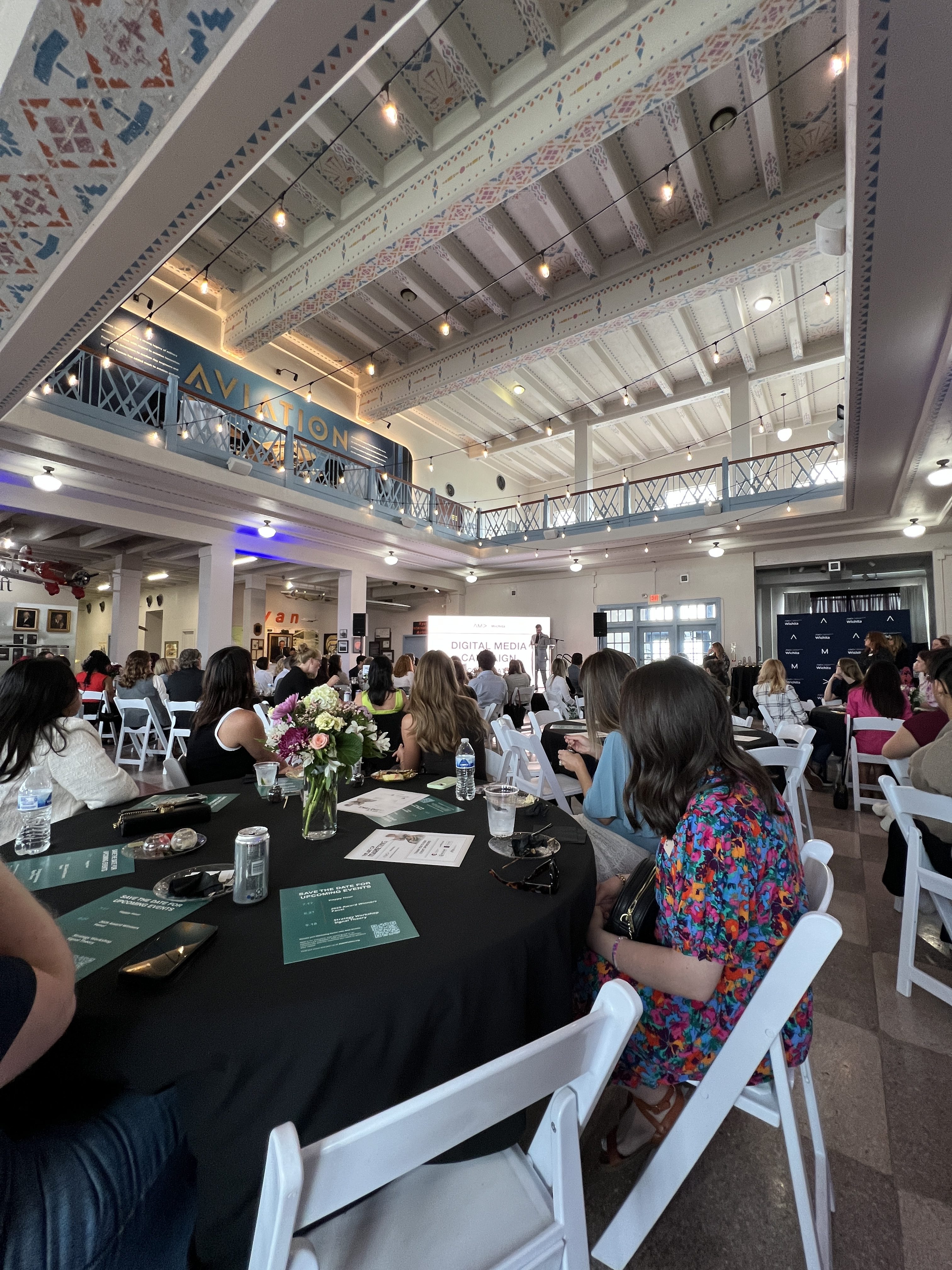 Photo of award ceremony from a table in back